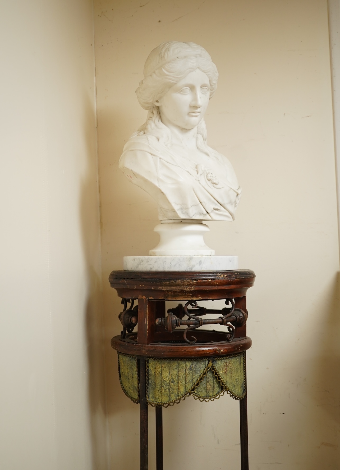 A Victorian style carved marble bust and later pedestal on ornate stand